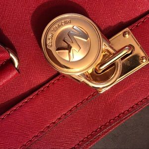 Original Michael Kors large satchel in burgundy.